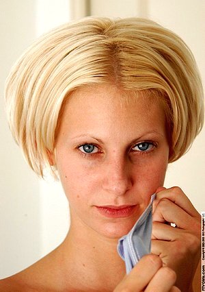 Blue-eyed blonde takes off her thong to try on different panties