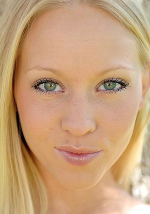 Blond-haired beauty shows her wet hole underneath that denim skirt