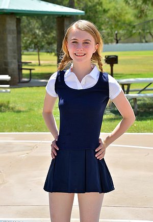 Adorable & 100% legal schoolgirl showing her hairless pussy and beyond