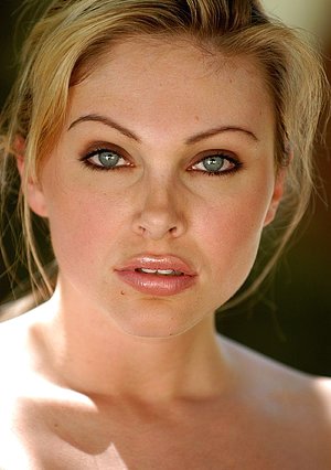 Blue-eyed blondie in sexy lingerie having lots of fun for the camera