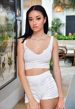 Skinny lady shows her body after smiling and playing around with her phone