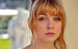 Big boobs blonde teen waves you goodbye while posing in public