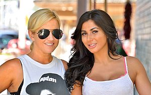 Brunette with a perfect ass showing off her slim body in public